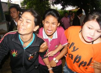 Horrified friends and relatives rush to the scene.